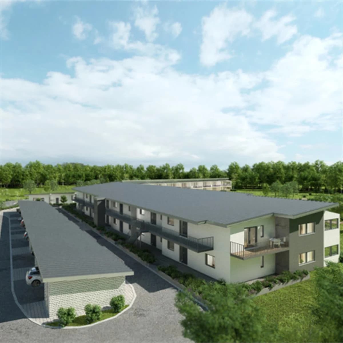 Brf Tylöskogen i Halmstad, moderna byggnader med grönskande omgivningar.